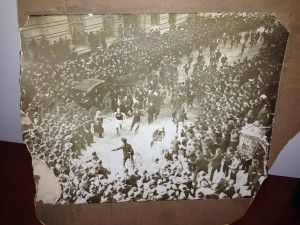 Lorden at the finish line of the 1903 race with the huge crowd being held back by police